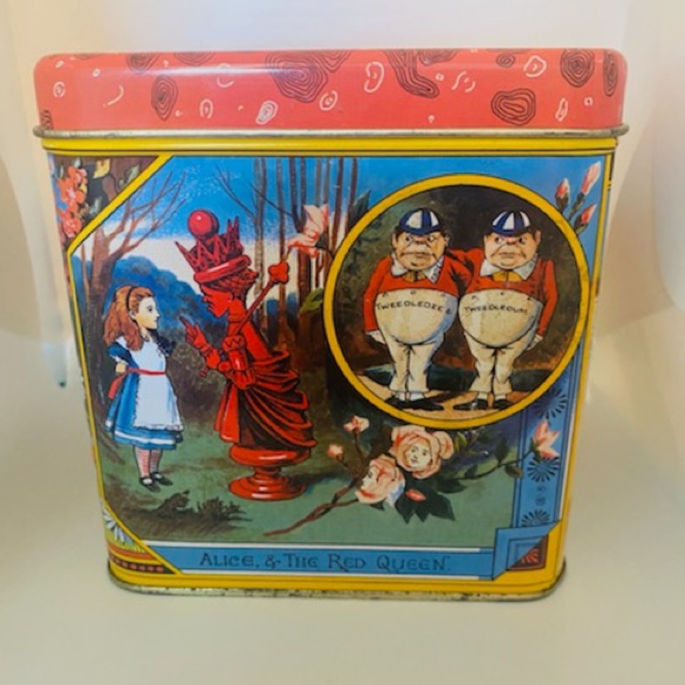 Vintage: Alice in Wonderland replica biscuit tin of original looking glass.